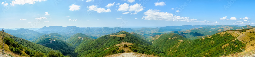 Beautiful view of the peaks of the Caucasus mountains on a Sunny day. Panorama