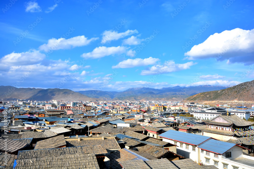 lots of old roof with blue sky in old town of Shangrila, Zhongdian, china