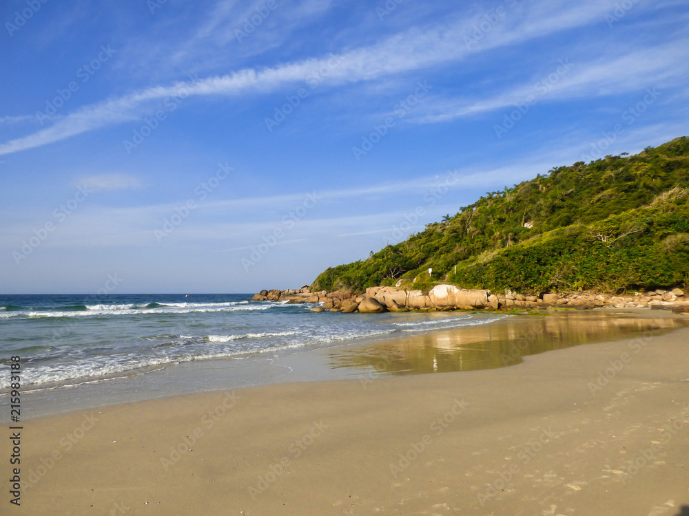 A view of Brava beach, located in Florianopolis, Brazil - Morro das Feiticeiras in the background