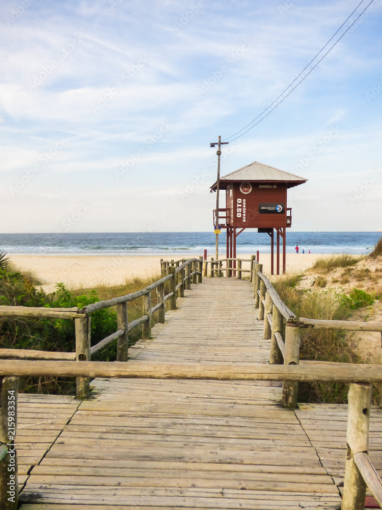 Florianopolis, Brazil - Circa July 2018: Lifeguard Booth at Ingleses beach, sky with sunset colors in the background