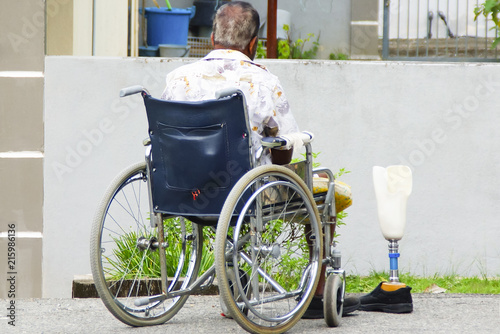 Kuala Lipis , Pahang, Malaysia, 26.1.2018 - Elderly Man Sitting On A Wheelchair And Using Prosthetic Leg