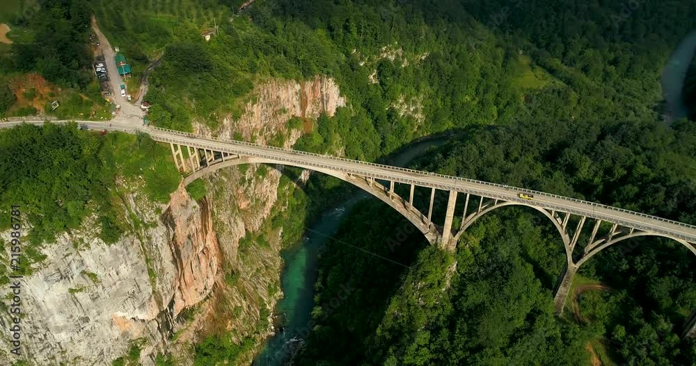 Aerial View of Durdevica Tara Arc Bridge in the Mountains, One of the Highest Automobile Bridges in Europe. Aerial View of Durdevica Tara Arc Bridge in the Mountains, One of the Highest Automobile Bridges in Europe.
