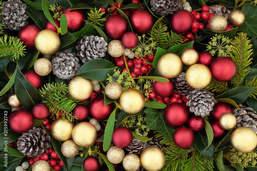 Christmas background with red and gold bauble decorations with flora of ...