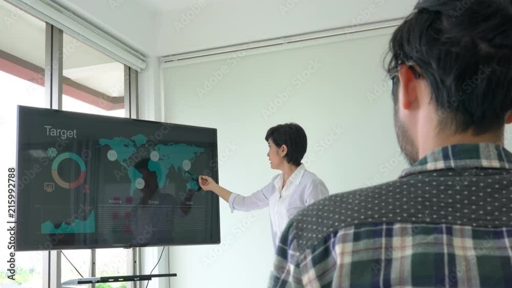 Business woman present project plan and meeting together for sharing business ideas. Concept of brainstorming, war room, meeting teamwork and dashboard.