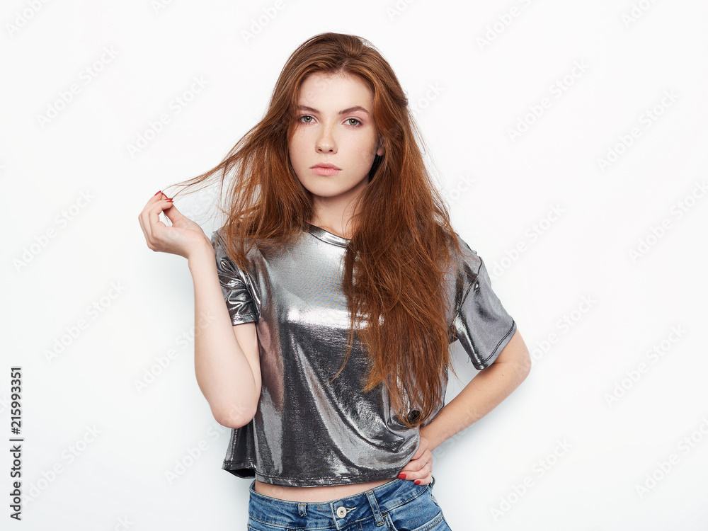 Young beautiful excited woman with gorgeous natural red hair green eyes, blank copy space on white background for advertisement or promotional text Young beautiful excited woman with gorgeous natural red hair green eyes, blank copy space on white background for advertisement or promotional text
