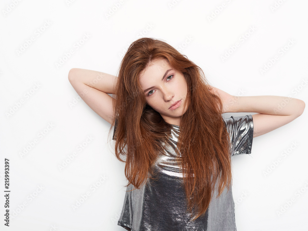 Young beautiful excited woman with gorgeous natural red hair green eyes, blank copy space on white background for advertisement or promotional text Young beautiful excited woman with gorgeous natural red hair green eyes, blank copy space on white background for advertisement or promotional text