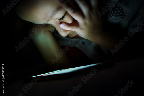Little Boy Playing With Smartphone In The Dark , Kids Addicted Playing With Smartphone