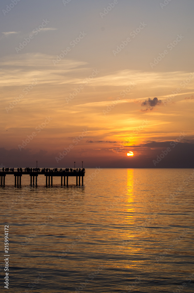 Colorful sunset at a famous marine pier in  Palanga, Lithuania, Europe