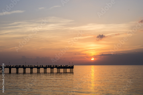 Colorful sunset at a famous marine pier in Palanga, Lithuania, Europe