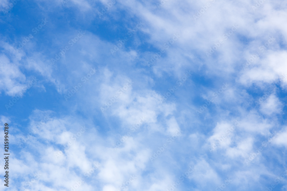 white fluffy clouds in the blue sky white fluffy clouds in the blue sky
