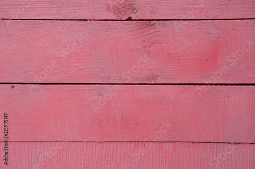 Wooden texture natural background of pink color