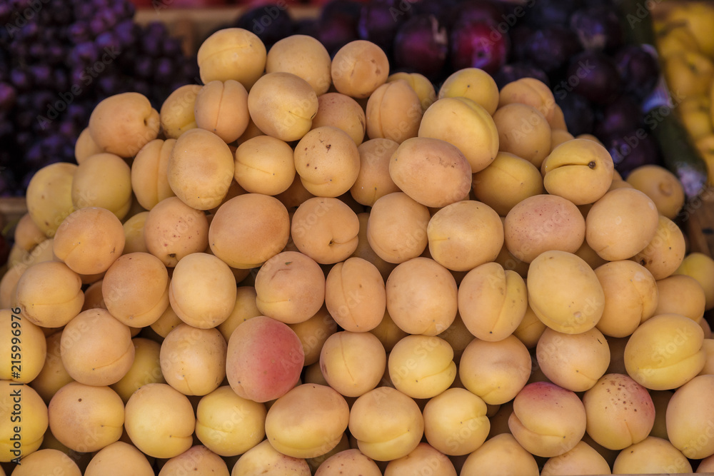 Juicy fresh apricots on window counter, on natural light. Juicy fresh apricots on window counter, on natural light.