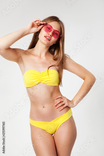 Lovely woman in yellow bikini © Amelia Fox