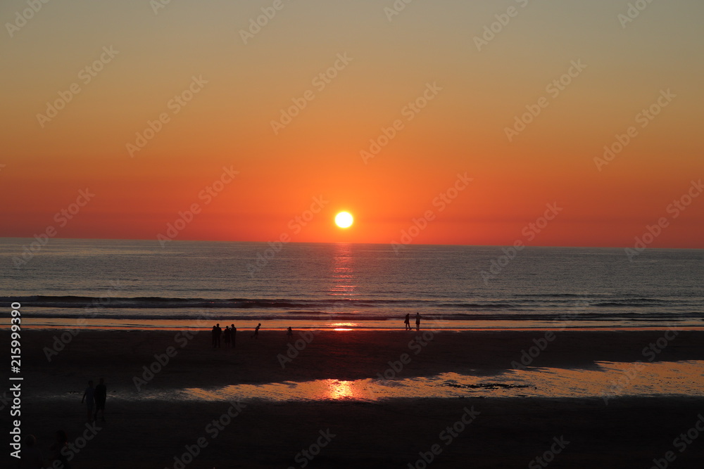 Fototapeta premium newquay cornwall summer 2018 beach,family fun a and sunset skis.