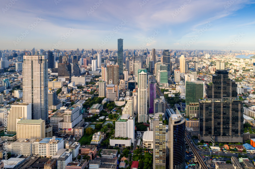 Aerial view of Bangkok modern office buildings, condominium in Bangkok city downtown with sunset sky ,Bangkok is the most populated city in Southeast Asia. Bangkok , Thailand