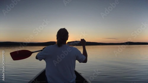1080p 25fps Canoeing in Finland, watching the un-setting sun over lake Inari in the Arctic Circle. Unusually warm weather, 30c. Ultimate serenity and calm. photo