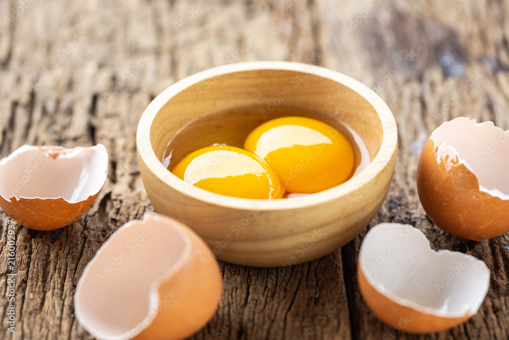 Fresh eggs on wooden table for food concept Fresh eggs on wooden table for food concept