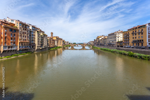 Colorful old buildings line the Arno River in Florence  Italy