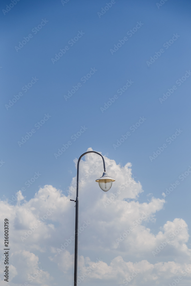Lantern against the blue sky. Bright blue sky and on its background a lantern.