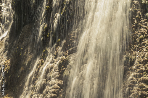 soft water of the stream in the natural park, Beautiful waterfall in rain forest