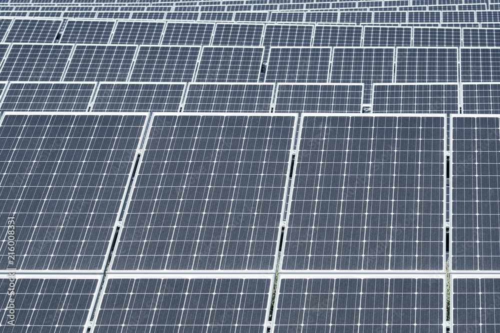 Texture of solar panels in the field. Ecolongically clean energy production. Alternative energy sources Texture of solar panels in the field. Ecolongically clean energy production. Alternative energy sources