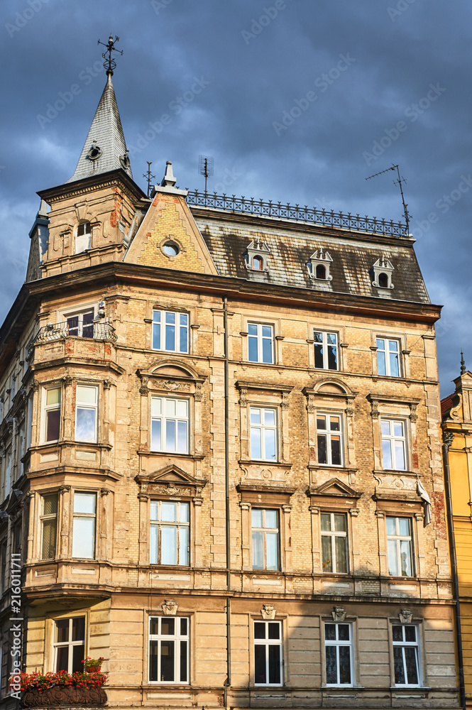 Facade of historic tenement house on the market in Swidnica in Poland.