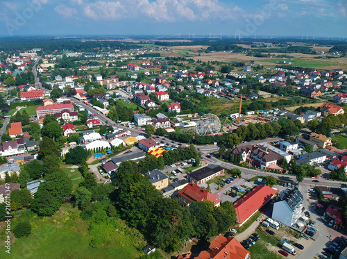 Aerial view on a small polish city with trees and fields