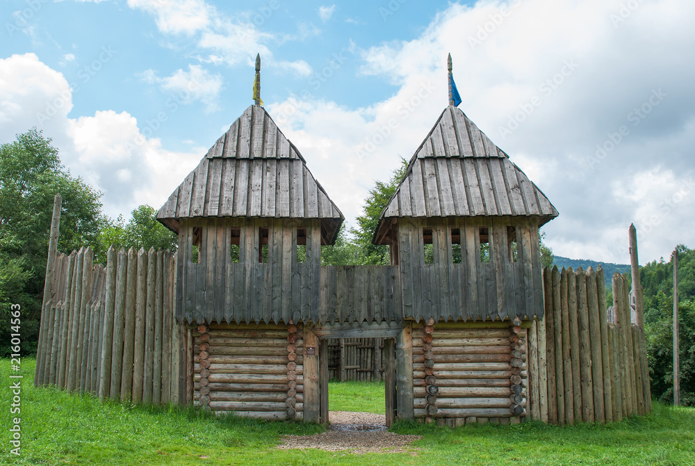 Wooden fortress towers, reconstruction of old battles, forest lawn Wooden fortress towers, reconstruction of old battles, forest lawn
