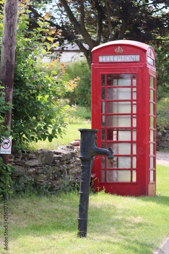 old fashioned english red phone box in a country lane  © Wendy