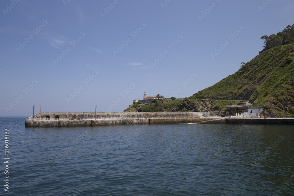 Cudillero breakwater and lighthouse