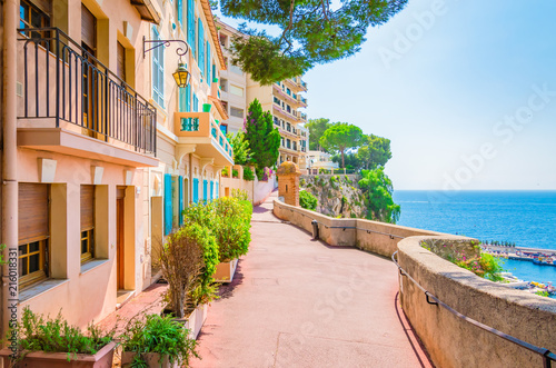 Fototapeta Naklejka Na Ścianę i Meble -  Monaco, Monte carlo. Monaco village with colorful architecture and street along the ocean.