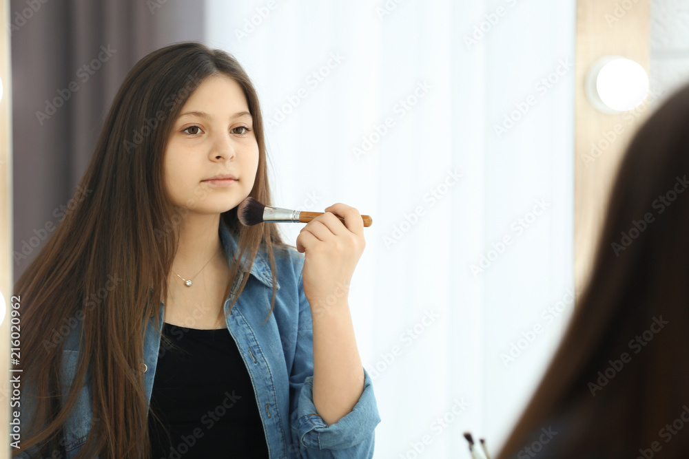 Attractive teenage girl in dressing room Attractive teenage girl in dressing room