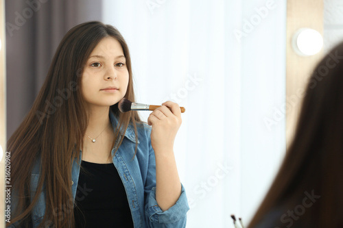 Attractive teenage girl in dressing room