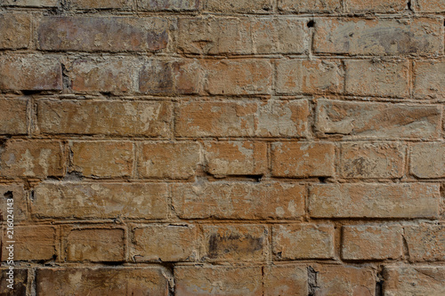 Orange brick rustic textured background with a cement in a seams