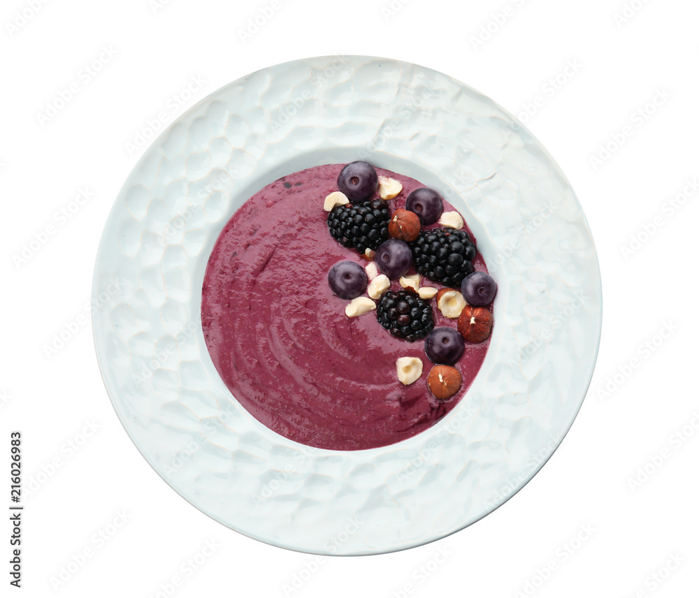 Fototapeta premium Plate with tasty acai smoothie on white background, top view