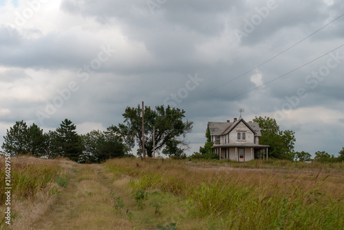 House with cloudy sky