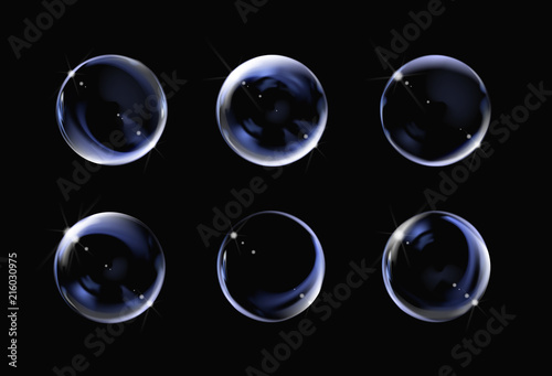 Realistic transparent soap bubble on black background. Soap Bubble set with glares. Bubbles illustration vector.