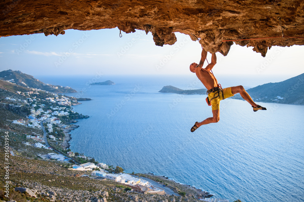 Rock climber at Scenic  Rocks  in beautiful golden light on a sunny day. - obrazy, fototapety, plakaty 