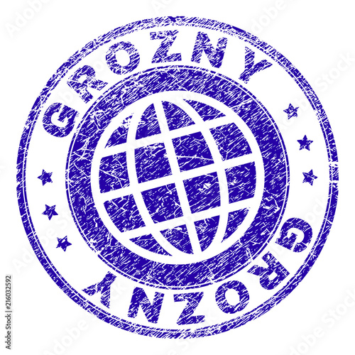 GROZNY stamp imprint with distress texture. Blue vector rubber seal imprint of GROZNY caption with dirty texture. Seal has words placed by circle and globe symbol.