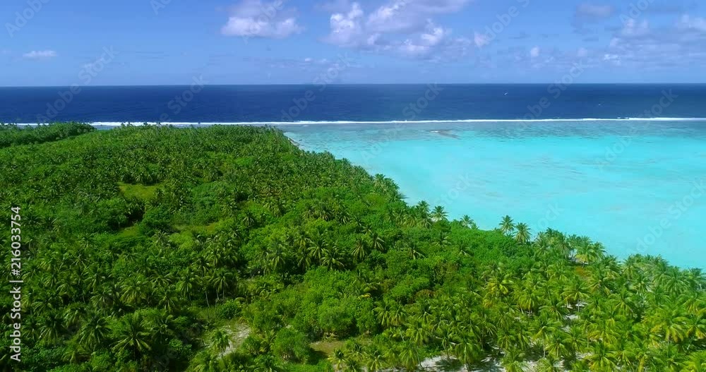 small islands (motu) in the middle of a lagoon in aerial view, French Polynesia small islands (motu) in the middle of a lagoon in aerial view, French Polynesia