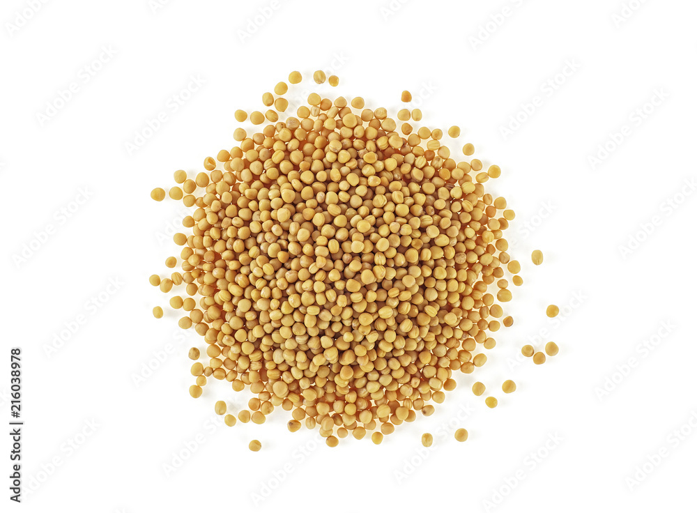Pile of yellow mustard seeds isolated on white background. Top view. Pile of yellow mustard seeds isolated on white background. Top view.