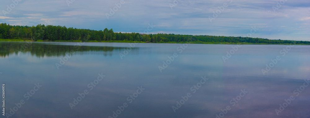 Panorama - clouds reflected in lake