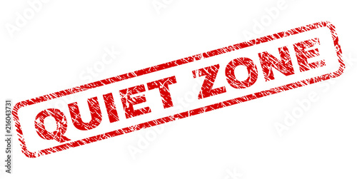 QUIET ZONE stamp seal print with distress style. Red vector rubber print of QUIET ZONE caption with unclean texture. Text caption is placed inside rounded rectangle frame.