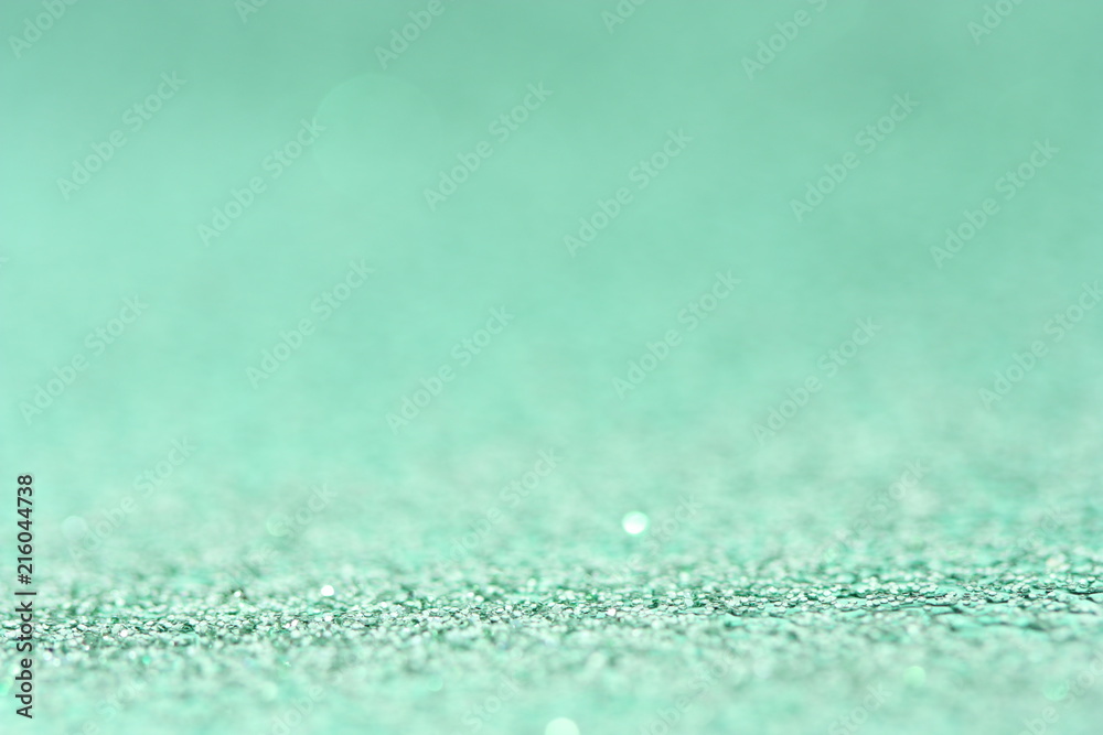Obraz premium Cyan background with glitter.
