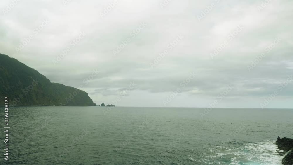 Up view of waves of ocean from cliffy shore of the north of Madeira Up view of waves of ocean from cliffy shore of the north of Madeira