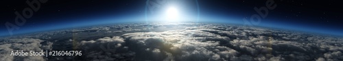Sunrise over the planet. Panorama of clouds under the sun.
 photo