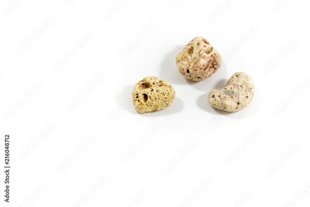 Close-up shot of three stones which are positioned right side that collected from beach Close-up shot of three stones which are positioned right side that collected from beach