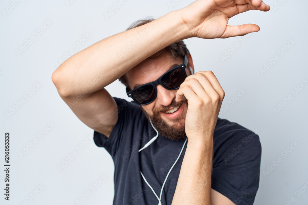 man in glasses with headphones