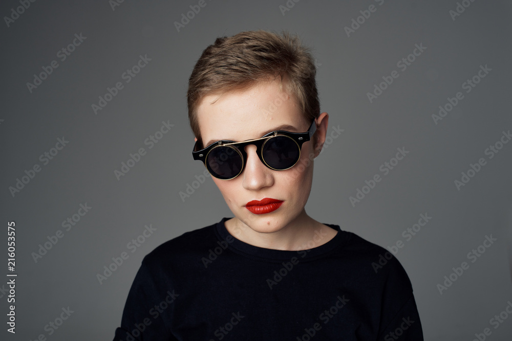 woman in black glasses with red lipstick fashion portrait woman in black glasses with red lipstick fashion portrait