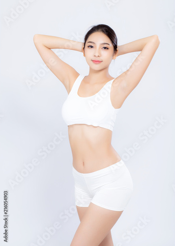 Portrait young asian woman smiling beautiful body diet with fit isolated on white background, model girl weight slim with cellulite or calories, health and wellness concept. © N_studio